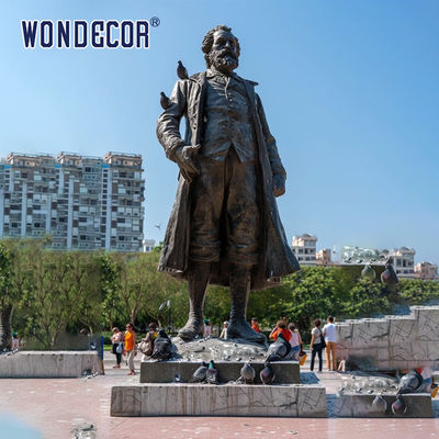 Bronze figure sculpture in urban square garden